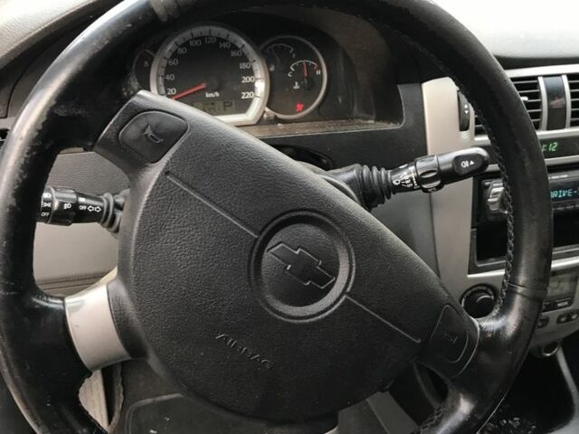 Сірий Шевроле Лачетті, об'ємом двигуна 1.8 л та пробігом 220 тис. км за 1072 $, фото 9 на Automoto.ua