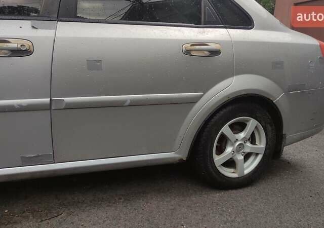 Серый Шевроле Лачетти, объемом двигателя 1.6 л и пробегом 273 тыс. км за 2600 $, фото 2 на Automoto.ua