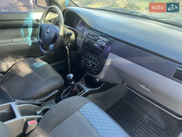 Серый Шевроле Лачетти, объемом двигателя 1.6 л и пробегом 300 тыс. км за 3200 $, фото 11 на Automoto.ua