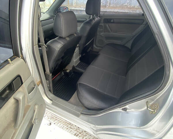 Сірий Шевроле Лачетті, об'ємом двигуна 1.6 л та пробігом 385 тис. км за 3750 $, фото 2 на Automoto.ua