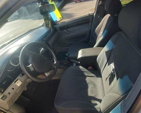 Серый Шевроле Лачетти, объемом двигателя 1.6 л и пробегом 177 тыс. км за 4500 $, фото 2 на Automoto.ua