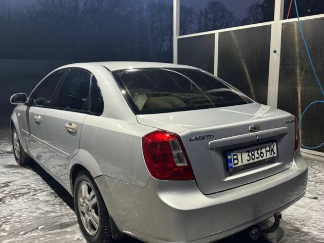 Серый Шевроле Лачетти, объемом двигателя 1.8 л и пробегом 244 тыс. км за 3100 $, фото 1 на Automoto.ua