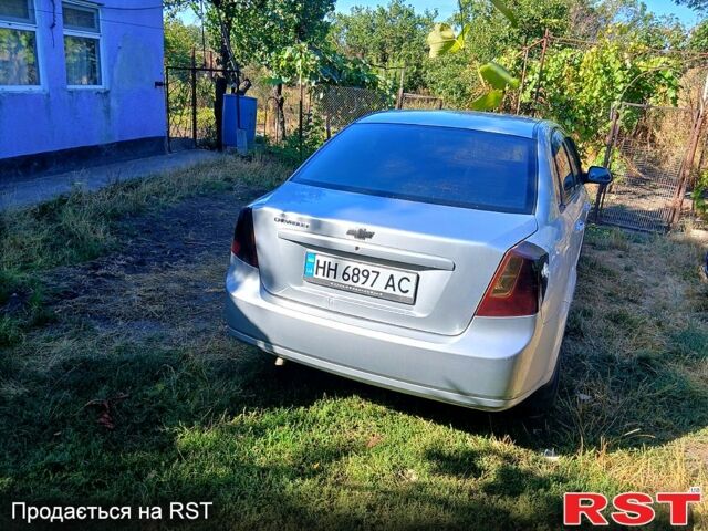 Серый Шевроле Лачетти, объемом двигателя 1.6 л и пробегом 235 тыс. км за 3450 $, фото 4 на Automoto.ua