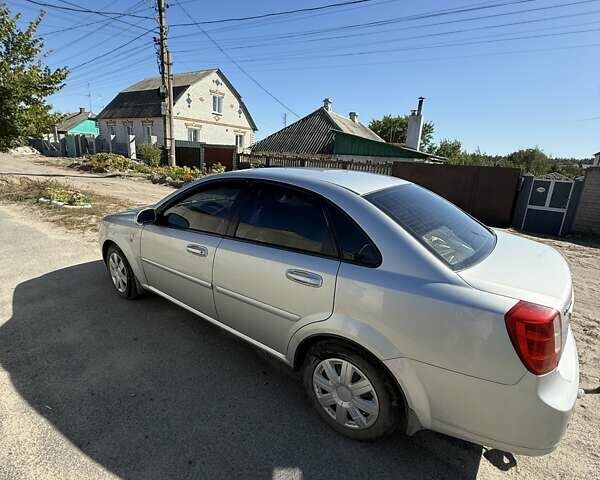 Серый Шевроле Лачетти, объемом двигателя 1.8 л и пробегом 149 тыс. км за 4800 $, фото 3 на Automoto.ua