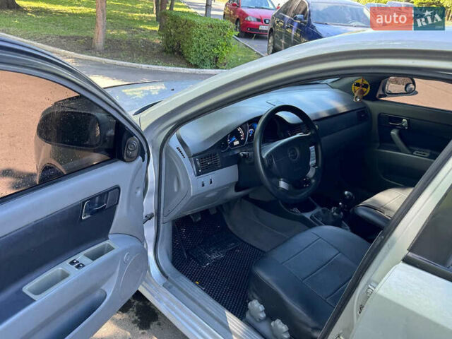 Сірий Шевроле Лачетті, об'ємом двигуна 1.8 л та пробігом 170 тис. км за 3300 $, фото 3 на Automoto.ua