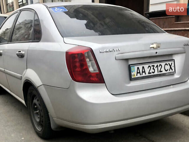 Серый Шевроле Лачетти, объемом двигателя 1.8 л и пробегом 250 тыс. км за 2999 $, фото 3 на Automoto.ua