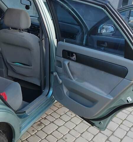 Сірий Шевроле Лачетті, об'ємом двигуна 1.8 л та пробігом 250 тис. км за 4100 $, фото 12 на Automoto.ua