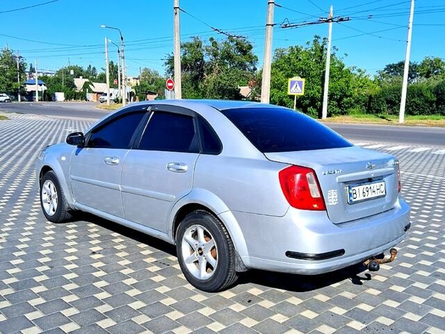 Серый Шевроле Лачетти, объемом двигателя 1.6 л и пробегом 210 тыс. км за 3450 $, фото 2 на Automoto.ua