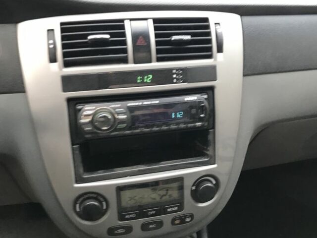 Сірий Шевроле Лачетті, об'ємом двигуна 1.8 л та пробігом 220 тис. км за 1072 $, фото 12 на Automoto.ua