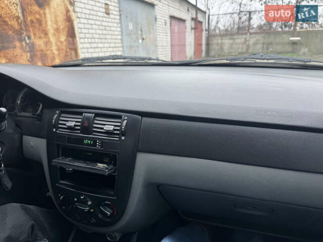 Сірий Шевроле Лачетті, об'ємом двигуна 1.6 л та пробігом 227 тис. км за 4200 $, фото 23 на Automoto.ua