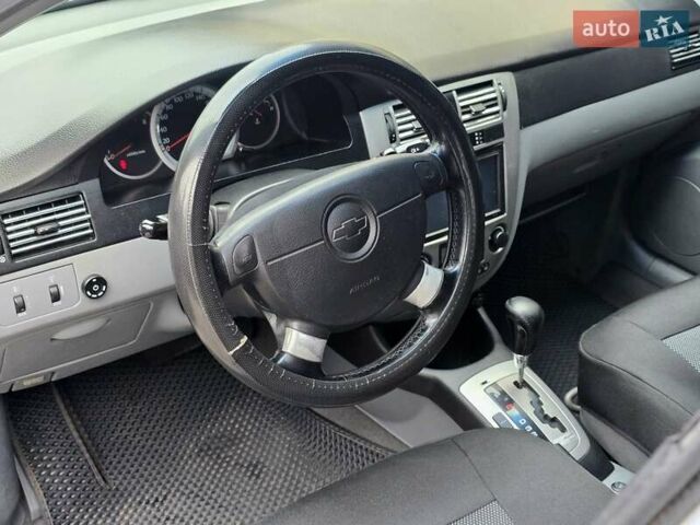 Серый Шевроле Лачетти, объемом двигателя 1.8 л и пробегом 240 тыс. км за 3900 $, фото 11 на Automoto.ua