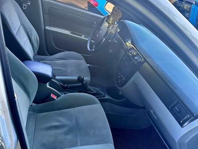 Серый Шевроле Лачетти, объемом двигателя 1.8 л и пробегом 390 тыс. км за 3650 $, фото 2 на Automoto.ua