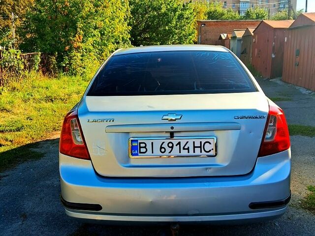 Серый Шевроле Лачетти, объемом двигателя 1.6 л и пробегом 210 тыс. км за 3450 $, фото 5 на Automoto.ua
