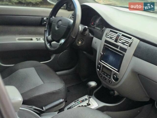 Серый Шевроле Лачетти, объемом двигателя 1.8 л и пробегом 240 тыс. км за 3999 $, фото 23 на Automoto.ua