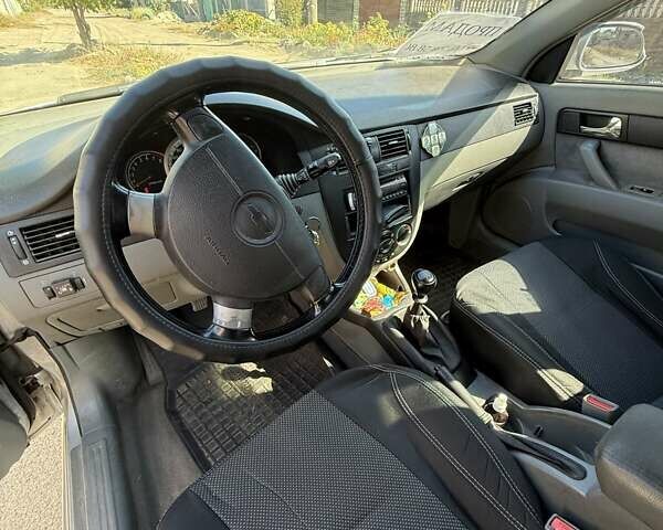 Серый Шевроле Лачетти, объемом двигателя 1.8 л и пробегом 149 тыс. км за 4800 $, фото 6 на Automoto.ua