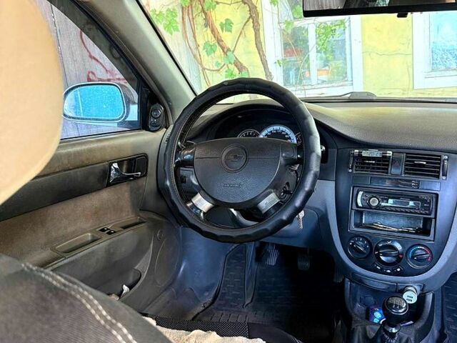 Серый Шевроле Лачетти, объемом двигателя 1.8 л и пробегом 149 тыс. км за 5000 $, фото 5 на Automoto.ua