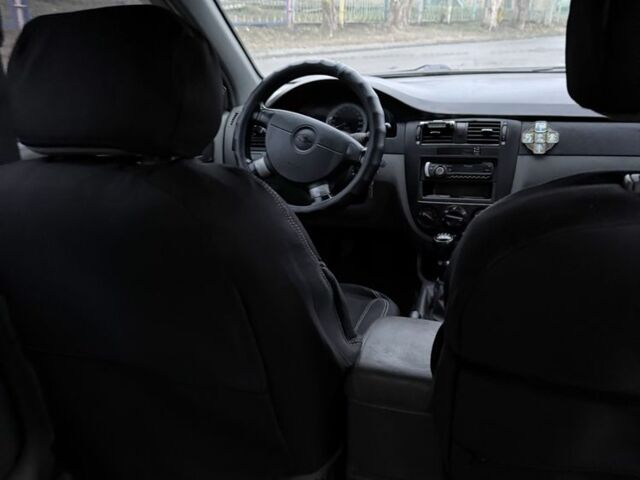 Серый Шевроле Лачетти, объемом двигателя 1.8 л и пробегом 149 тыс. км за 4500 $, фото 5 на Automoto.ua