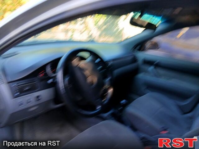 Серый Шевроле Лачетти, объемом двигателя 1.6 л и пробегом 235 тыс. км за 3450 $, фото 2 на Automoto.ua