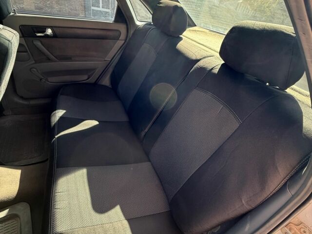 Серый Шевроле Лачетти, объемом двигателя 1.8 л и пробегом 149 тыс. км за 4800 $, фото 4 на Automoto.ua