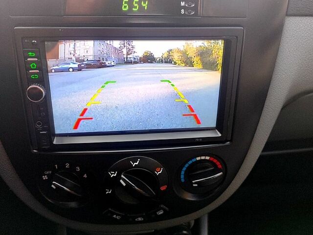 Сірий Шевроле Лачетті, об'ємом двигуна 1.8 л та пробігом 240 тис. км за 4600 $, фото 12 на Automoto.ua