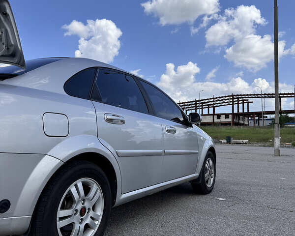 Сірий Шевроле Лачетті, об'ємом двигуна 1.8 л та пробігом 222 тис. км за 4100 $, фото 5 на Automoto.ua