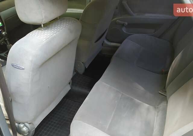 Серый Шевроле Лачетти, объемом двигателя 1.6 л и пробегом 330 тыс. км за 3400 $, фото 11 на Automoto.ua