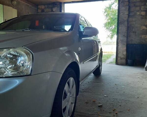 Серый Шевроле Лачетти, объемом двигателя 1.8 л и пробегом 191 тыс. км за 5000 $, фото 4 на Automoto.ua