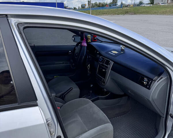 Сірий Шевроле Лачетті, об'ємом двигуна 1.8 л та пробігом 222 тис. км за 4100 $, фото 11 на Automoto.ua