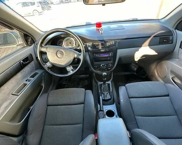 Серый Шевроле Лачетти, объемом двигателя 1.8 л и пробегом 170 тыс. км за 2999 $, фото 12 на Automoto.ua