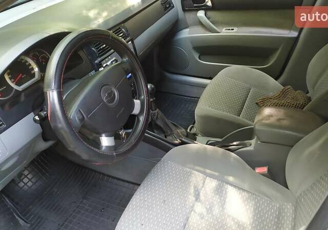 Серый Шевроле Лачетти, объемом двигателя 1.6 л и пробегом 330 тыс. км за 3400 $, фото 10 на Automoto.ua