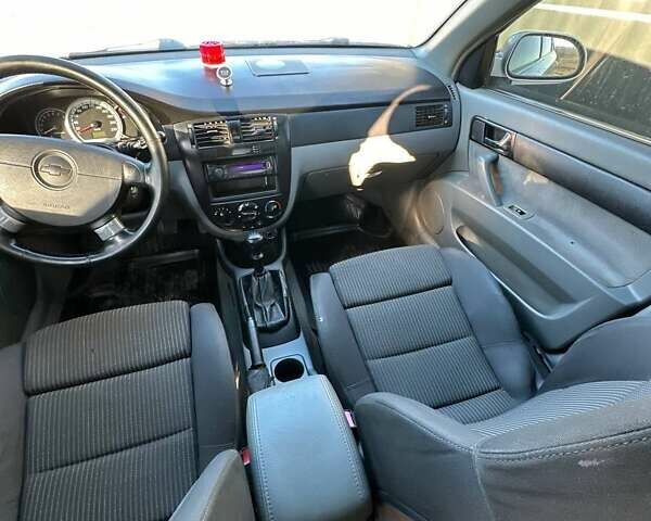 Серый Шевроле Лачетти, объемом двигателя 1.8 л и пробегом 170 тыс. км за 2999 $, фото 7 на Automoto.ua