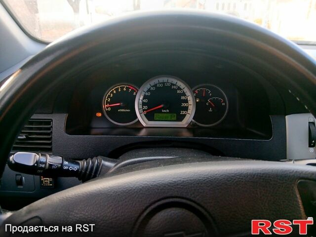 Серый Шевроле Лачетти, объемом двигателя 1.8 л и пробегом 248 тыс. км за 4000 $, фото 5 на Automoto.ua