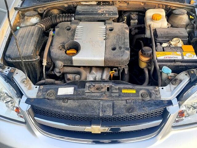 Сірий Шевроле Лачетті, об'ємом двигуна 1.8 л та пробігом 240 тис. км за 4600 $, фото 13 на Automoto.ua