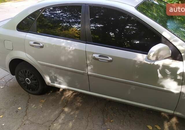 Серый Шевроле Лачетти, объемом двигателя 1.6 л и пробегом 330 тыс. км за 3400 $, фото 4 на Automoto.ua