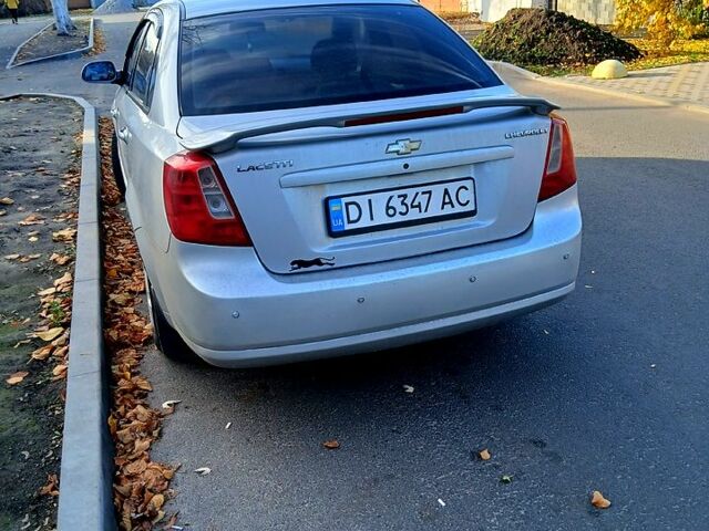 Серый Шевроле Лачетти, объемом двигателя 1.8 л и пробегом 248 тыс. км за 4000 $, фото 2 на Automoto.ua