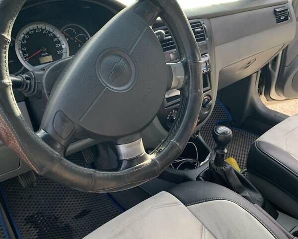 Серый Шевроле Лачетти, объемом двигателя 1.8 л и пробегом 300 тыс. км за 4200 $, фото 9 на Automoto.ua