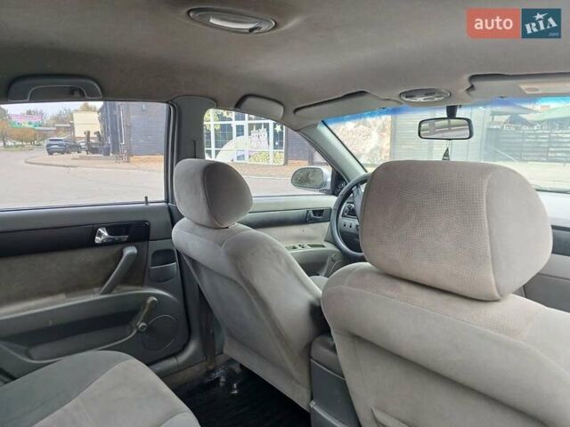 Сірий Шевроле Лачетті, об'ємом двигуна 1.8 л та пробігом 230 тис. км за 4500 $, фото 5 на Automoto.ua