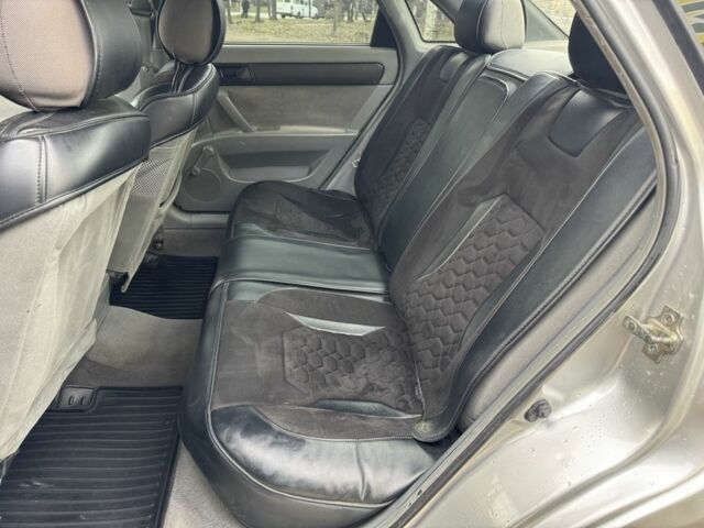 Сірий Шевроле Лачетті, об'ємом двигуна 1.6 л та пробігом 250 тис. км за 3850 $, фото 8 на Automoto.ua