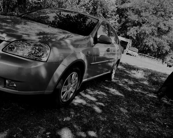 Серый Шевроле Лачетти, объемом двигателя 1.8 л и пробегом 191 тыс. км за 5000 $, фото 28 на Automoto.ua