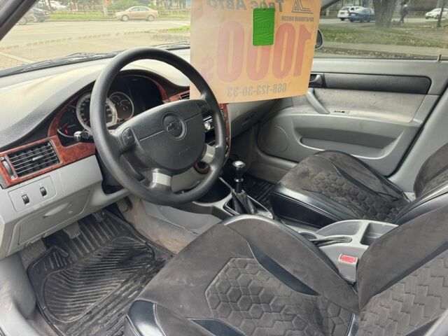 Сірий Шевроле Лачетті, об'ємом двигуна 1.6 л та пробігом 250 тис. км за 3850 $, фото 7 на Automoto.ua