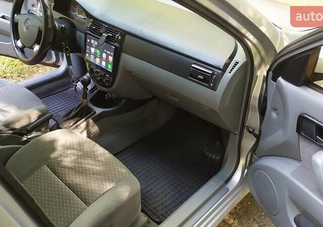 Серый Шевроле Лачетти, объемом двигателя 1.6 л и пробегом 330 тыс. км за 3400 $, фото 12 на Automoto.ua