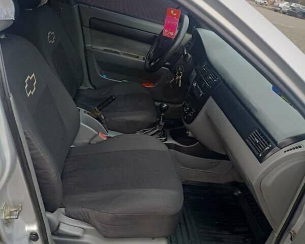 Серый Шевроле Лачетти, объемом двигателя 1.6 л и пробегом 322 тыс. км за 3300 $, фото 2 на Automoto.ua