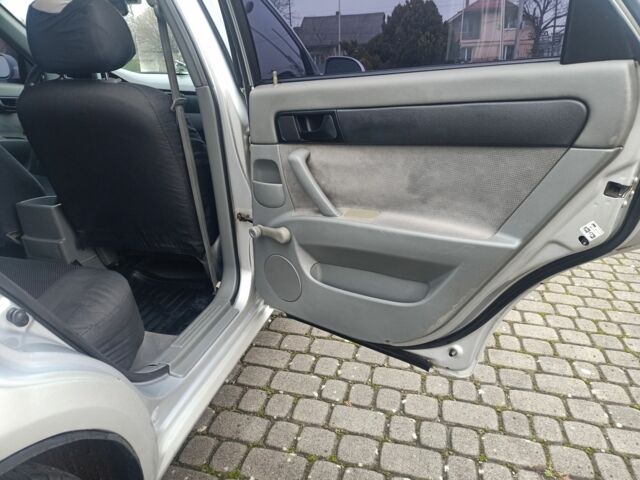 Серый Шевроле Лачетти, объемом двигателя 1.6 л и пробегом 322 тыс. км за 3300 $, фото 11 на Automoto.ua