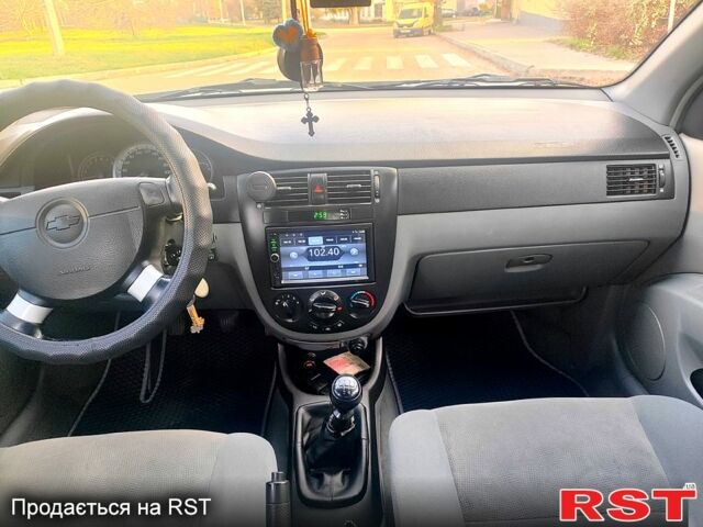 Сірий Шевроле Лачетті, об'ємом двигуна 1.8 л та пробігом 240 тис. км за 4600 $, фото 9 на Automoto.ua