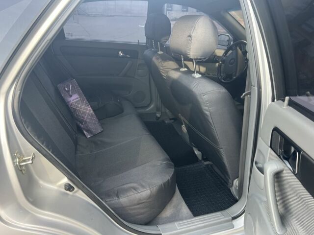 Сірий Шевроле Лачетті, об'ємом двигуна 1.8 л та пробігом 218 тис. км за 4900 $, фото 12 на Automoto.ua