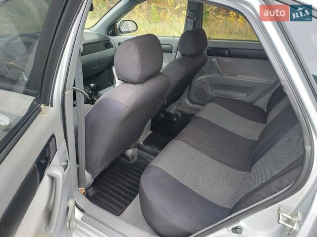 Серый Шевроле Лачетти, объемом двигателя 1.6 л и пробегом 210 тыс. км за 4900 $, фото 7 на Automoto.ua