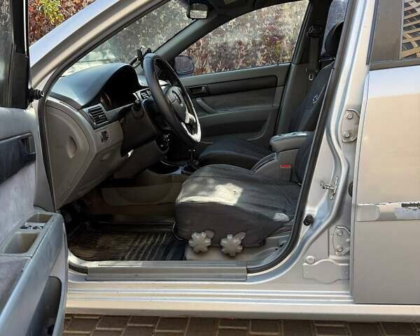 Серый Шевроле Лачетти, объемом двигателя 1.6 л и пробегом 111 тыс. км за 2600 $, фото 6 на Automoto.ua