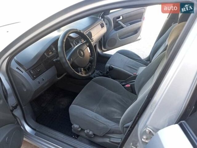 Серый Шевроле Лачетти, объемом двигателя 1.8 л и пробегом 193 тыс. км за 5400 $, фото 3 на Automoto.ua