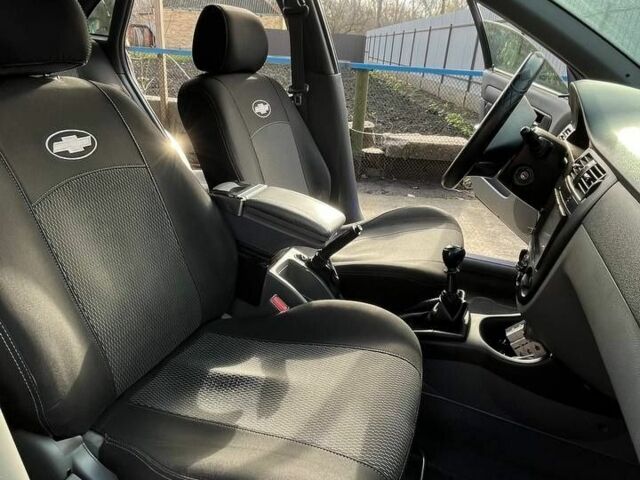 Серый Шевроле Лачетти, объемом двигателя 1.6 л и пробегом 248 тыс. км за 4400 $, фото 19 на Automoto.ua