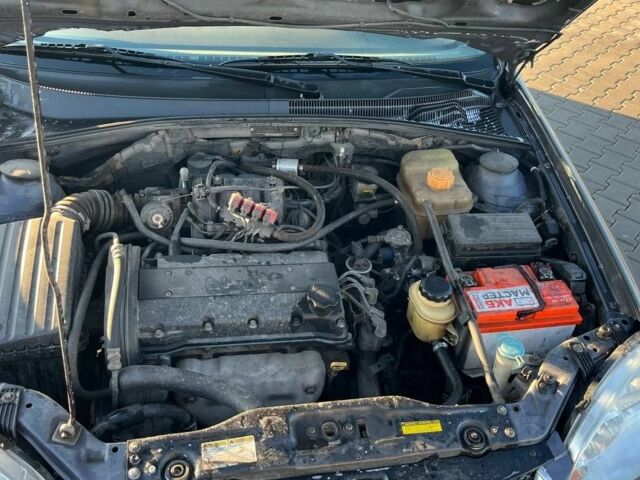 Серый Шевроле Лачетти, объемом двигателя 1.6 л и пробегом 248 тыс. км за 4400 $, фото 13 на Automoto.ua